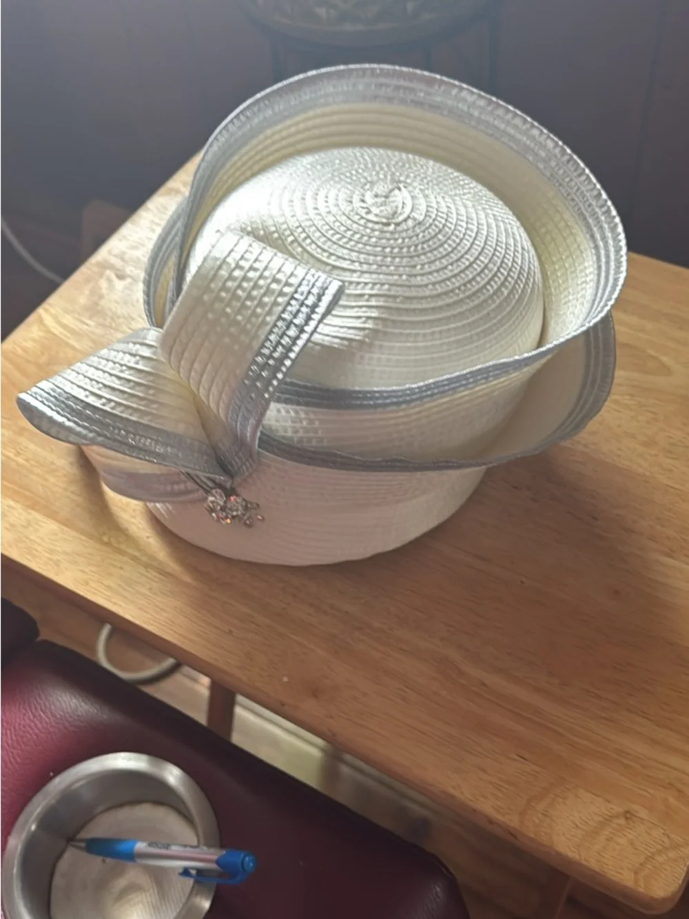 Elegant White and Silver Women's Dress Hat with Bow Accent
